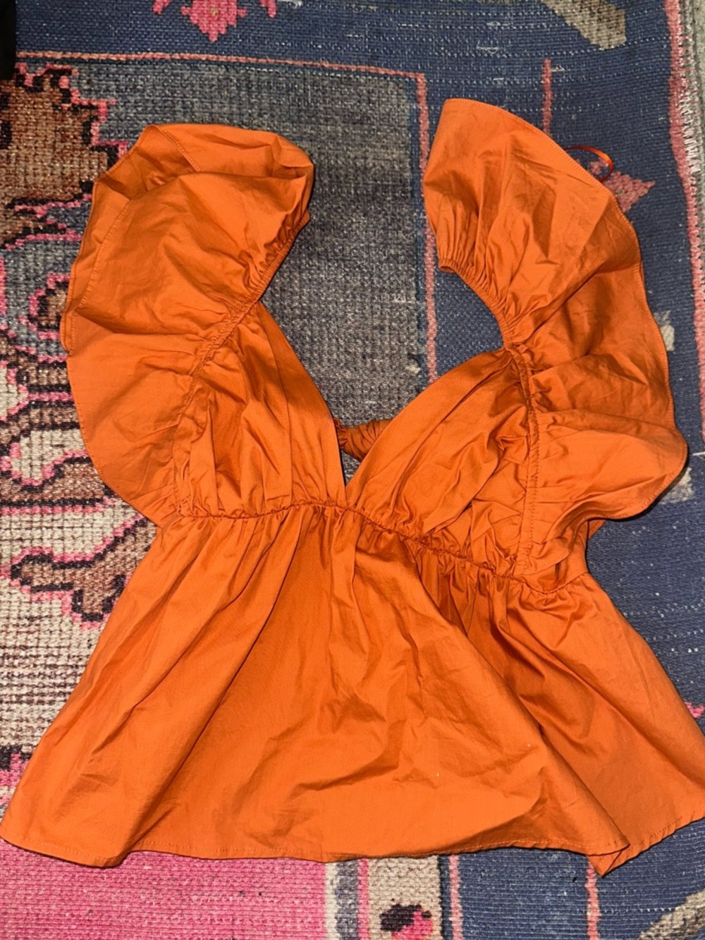 Orange Ruffled V-Neck Peplum Top